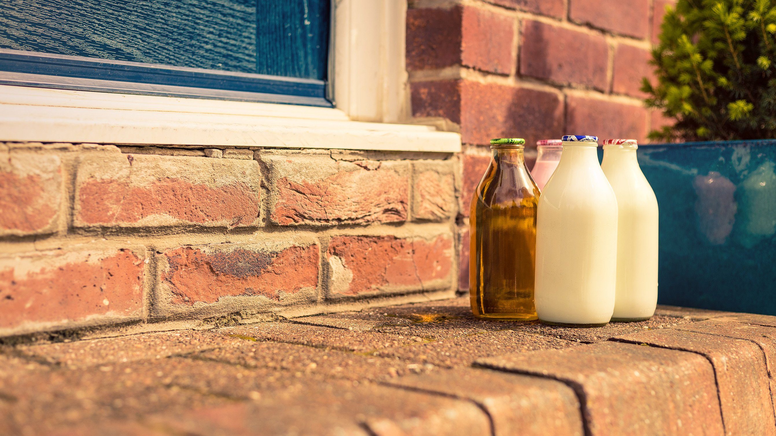 Milk bottles on doorstep