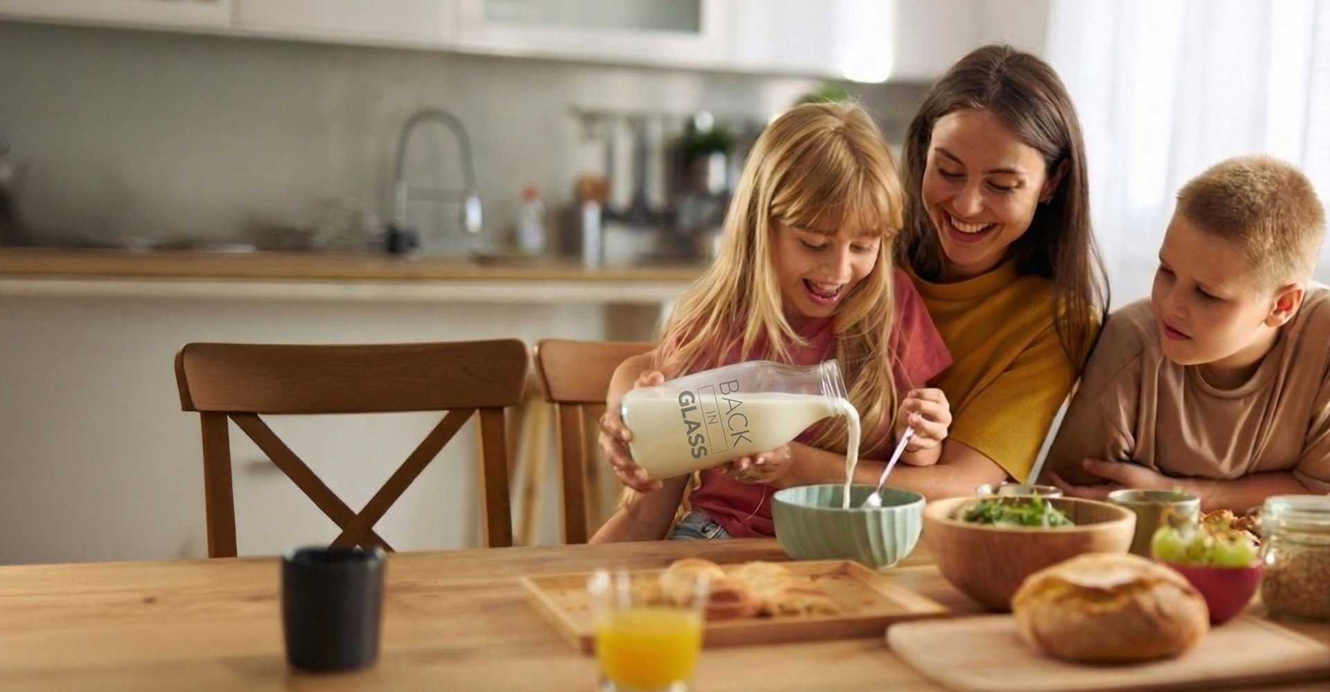 Family at breakfast table enjoying food